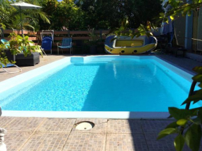 Villa de 4 chambres avec piscine partagee terrasse amenagee et wifi a Le Tampon